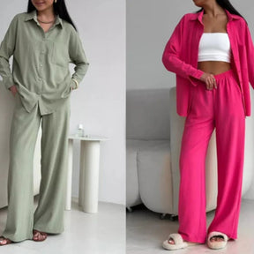 Elegant feminine set consisting of shirt and trousers