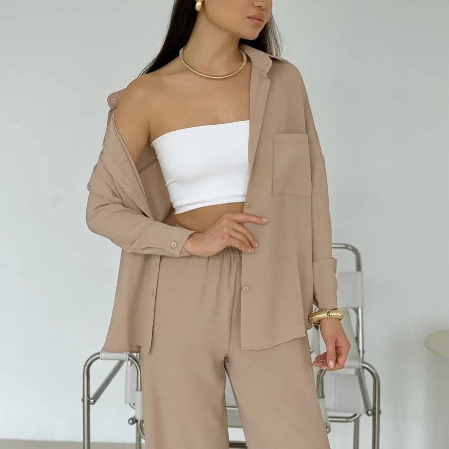 Elegant feminine set consisting of shirt and trousers
