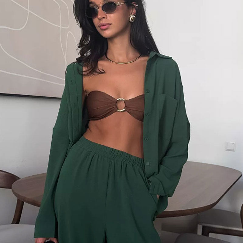 Elegant feminine set consisting of shirt and trousers