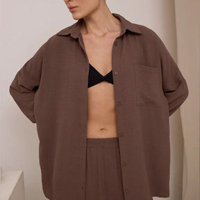 Elegant feminine set consisting of shirt and trousers