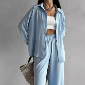 Elegant feminine set consisting of shirt and trousers