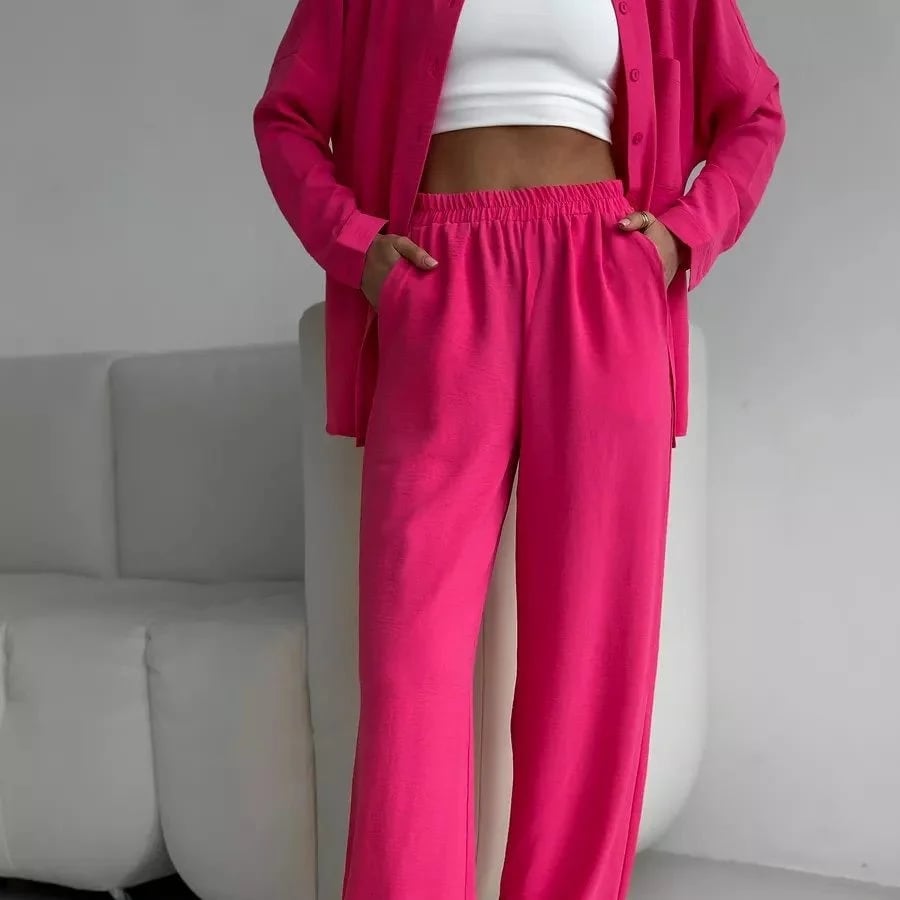 Elegant feminine set consisting of shirt and trousers