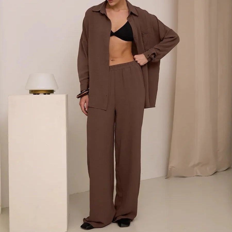 Elegant feminine set consisting of shirt and trousers